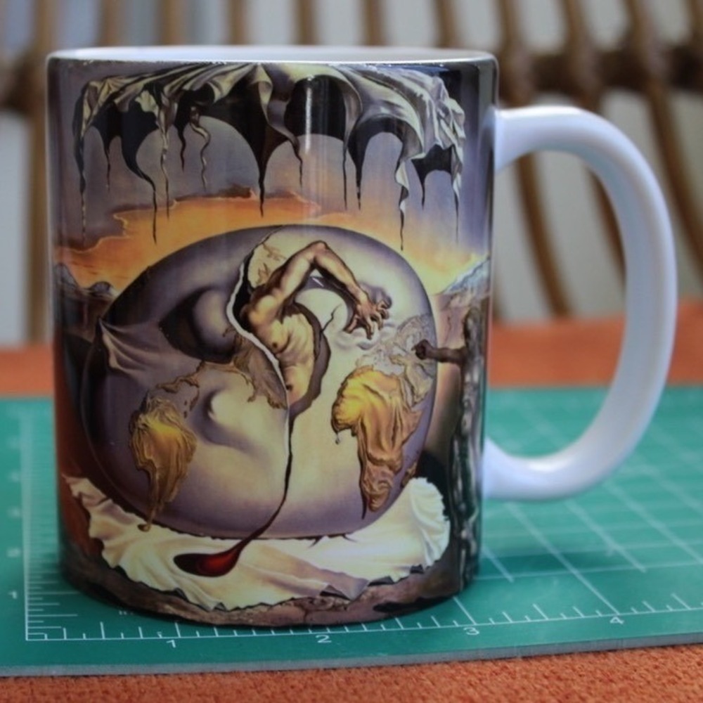 The Dali Museum Salvador Dali Geopoliticus Child Birth of the New Man Coffee Mug